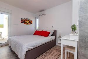 Postel nebo postele na pokoji v ubytování House Villa Ivona