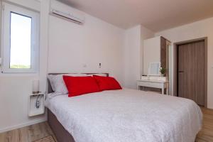 Postel nebo postele na pokoji v ubytování House Villa Ivona