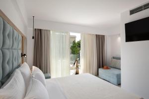 Cama o camas de una habitación en Hanioti Central Hotel