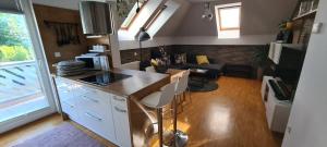 an aerial view of a kitchen and living room at Rozmarin Bled in Bled