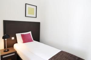Postelja oz. postelje v sobi nastanitve Fosshotel Westfjords