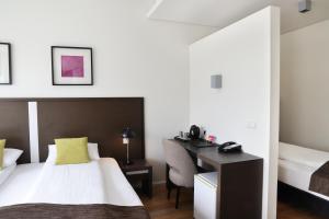 Postelja oz. postelje v sobi nastanitve Fosshotel Westfjords