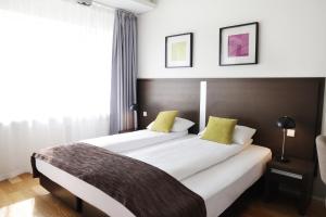 Postelja oz. postelje v sobi nastanitve Fosshotel Westfjords