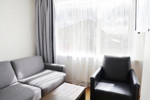 Predel za sedenje v nastanitvi Fosshotel Westfjords