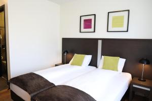 Postelja oz. postelje v sobi nastanitve Fosshotel Westfjords