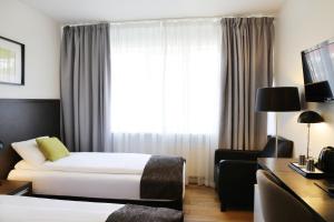 Postelja oz. postelje v sobi nastanitve Fosshotel Westfjords