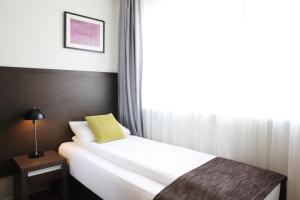Postelja oz. postelje v sobi nastanitve Fosshotel Westfjords
