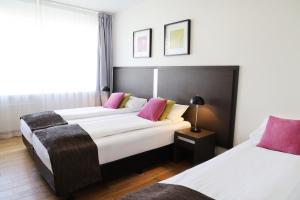 Postelja oz. postelje v sobi nastanitve Fosshotel Westfjords