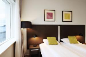 Postelja oz. postelje v sobi nastanitve Fosshotel Westfjords