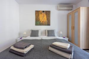 Postel nebo postele na pokoji v ubytování Apartment Vito