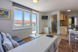 Kuchyň nebo kuchyňský kout v ubytování Apartment Vito