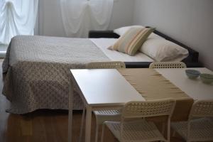 Posteľ alebo postele v izbe v ubytovaní Appartamenti Scrovegni