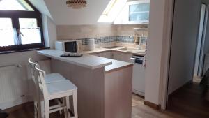 Η κουζίνα ή μικρή κουζίνα στο Domček