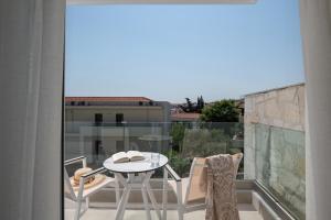 Un balcón o terraza de Hanioti Central Hotel