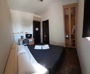 Postel nebo postele na pokoji v ubytování Hotel Torre Domini + 37 fotografií