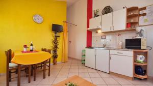 Kuchyňa alebo kuchynka v ubytovaní Apartments Malenica