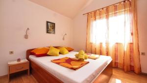 Posteľ alebo postele v izbe v ubytovaní Apartments Malenica