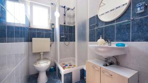 Kúpeľňa v ubytovaní Apartments Malenica + 17 fotografií