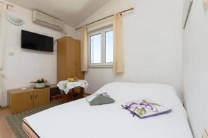 Posteľ alebo postele v izbe v ubytovaní Apartment Smiljana