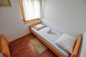 Postel nebo postele na pokoji v ubytování Apartments Kalista