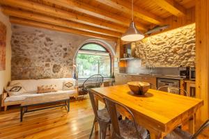 Posedenie v ubytovaní Masia Spa Can Pascol Casa Ecologica