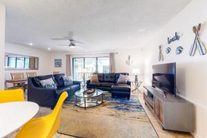 TV tai viihdekeskus majoituspaikassa Seashell 12