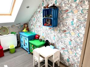 Χώρος καθιστικού στο Apartament turkusowy