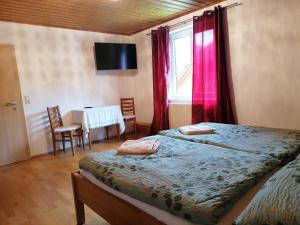 Katil atau katil-katil dalam bilik di Apartment Hörmann