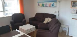 Posezení v ubytování Residenz am Strand Wohnung 4-59
