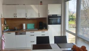 Kuchyň nebo kuchyňský kout v ubytování Residenz am Strand Wohnung 4-59