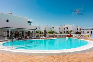 Bazén v ubytování Vivienda Vacacional Sea Garden nebo v jeho okolí