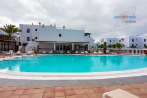 Bazén v ubytování Vivienda Vacacional Sea Garden nebo v jeho okolí