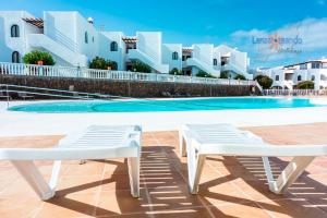 Bazén v ubytování Vivienda Vacacional Sea Garden nebo v jeho okolí