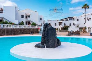 Bazén v ubytování Vivienda Vacacional Sea Garden nebo v jeho okolí