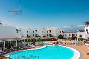 Bazén v ubytování Vivienda Vacacional Sea Garden nebo v jeho okolí