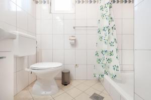 Kúpeľňa v ubytovaní Apartments Tomic + 37 fotografií