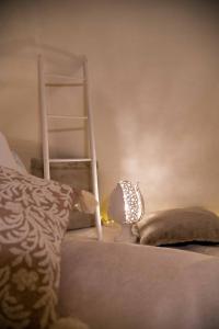 Letto o letti in una camera di Trullo dei tramonti