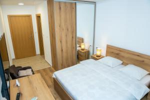 Postel nebo postele na pokoji v ubytování Guest House Alte