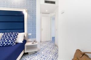 Postel nebo postele na pokoji v ubytování Hotel Sant'Agata