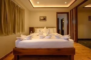 Chithara Comforts客房内的一张或多张床位