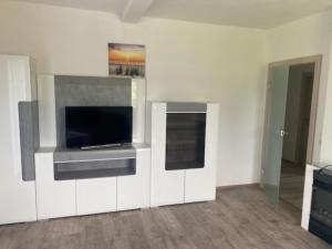 TV a/nebo společenská místnost v ubytování Apartment Erna