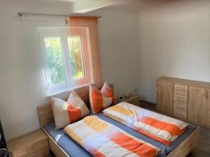 Postel nebo postele na pokoji v ubytování Apartment Erna