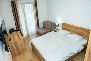 Postel nebo postele na pokoji v ubytování Guest House Alte