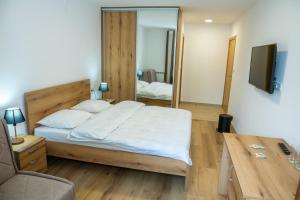 Postel nebo postele na pokoji v ubytování Guest House Alte