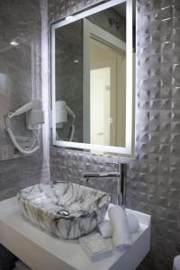 Łazienka w obiekcie Apartamentos La Quinta