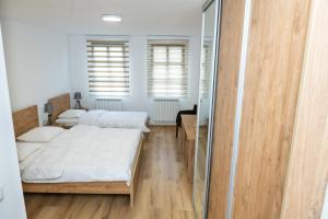 Postel nebo postele na pokoji v ubytování Guest House Alte