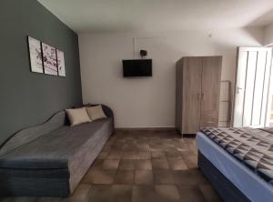 Posteľ alebo postele v izbe v ubytovaní Vasti Apartman