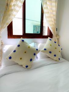 Postel nebo postele na pokoji v ubytování DAR ADIL KASBAH