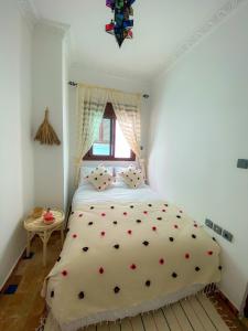 Postel nebo postele na pokoji v ubytování DAR ADIL KASBAH