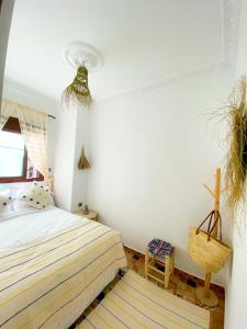 Postel nebo postele na pokoji v ubytování DAR ADIL KASBAH